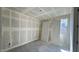 A potential secondary bedroom features a window for natural light and closet space at 15777 W Cheryl Dr, Waddell, AZ 85355