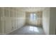 This bedroom features drywall, natural light from the window and no closet at 15777 W Cheryl Dr, Waddell, AZ 85355