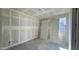 This bedroom features drywall, natural light from the window and a closet at 15777 W Cheryl Dr, Waddell, AZ 85355