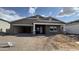 Charming single-Gathering home featuring a welcoming porch and an attached garage at 15777 W Cheryl Dr, Waddell, AZ 85355