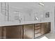 Bright bathroom with double vanity and large mirror at 15837 N 74Th Ln, Peoria, AZ 85382