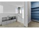 Upstairs hallway with artistic decoration and neutral carpet at 15837 N 74Th Ln, Peoria, AZ 85382