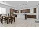 Open kitchen with stainless steel appliances and a dining area perfect for entertaining at 15837 N 74Th Ln, Peoria, AZ 85382