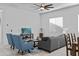 Bright open-concept living room with lots of natural light perfect for entertaining at 15837 N 74Th Ln, Peoria, AZ 85382