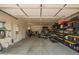 Spacious garage with ample storage shelves and room for vehicles at 16064 W Montana De Oro Dr, Surprise, AZ 85387