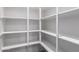 Clean, spacious walk-in pantry with multiple shelves, ready for organized storage solutions at 16064 W Montana De Oro Dr, Surprise, AZ 85387