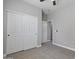 Bedroom with carpet, ceiling fan and closet with sliding doors at 16438 W Buchanan St, Goodyear, AZ 85338
