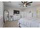 Spacious main bedroom features a ceiling fan, neutral decor, and ample natural light at 16438 W Buchanan St, Goodyear, AZ 85338