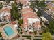 An aerial view of the community featuring lush landscaping and a pristine community pool at 1717 E Union Hills Dr # 1110, Phoenix, AZ 85024