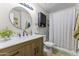 Bathroom with updated vanity, sleek fixtures, and shower-tub combination at 1717 E Union Hills Dr # 1110, Phoenix, AZ 85024