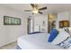 Comfortable bedroom featuring neutral walls, ceiling fan and closet storage at 1717 E Union Hills Dr # 1110, Phoenix, AZ 85024