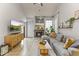 Cozy living area with a warm fireplace, stylish furnishings, and view to upper floor at 1717 E Union Hills Dr # 1110, Phoenix, AZ 85024