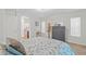 Cozy bedroom featuring neutral walls, carpeted floors, and access to an ensuite bathroom at 1920 E Bell Rd # 1034, Phoenix, AZ 85022
