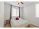 Bright bedroom featuring neutral walls, carpeted floors, and a cozy double bed at 1920 E Bell Rd # 1034, Phoenix, AZ 85022