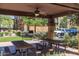 An open-air picnic area features tables, benches, and grills for outdoor dining at 1920 E Bell Rd # 1034, Phoenix, AZ 85022