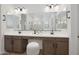 Bathroom featuring a large double vanity with seating and a large mirror at 20373 W Rovey Ave, Buckeye, AZ 85396