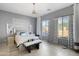 Spacious main bedroom with tile floors, white walls, and a large window at 2041 N 88Th St, Mesa, AZ 85207