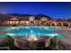 Resort-style community pool with stunning mountain views and a beautiful fountain feature at 2041 N 88Th St, Mesa, AZ 85207