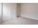 Bedroom with soft carpet and closet space, offers cozy appeal at 20449 N 105Th Ave, Peoria, AZ 85382