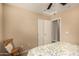 Bedroom featuring carpeted floor, ceiling fan, and closet with doors at 23006 W Cantilever St, Buckeye, AZ 85326