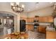Eat-in kitchen with stainless steel appliances and an adjacent breakfast nook at 23006 W Cantilever St, Buckeye, AZ 85326