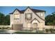 Charming two-story home boasts a well-manicured lawn, stone accents and neutral colors at 2541 E Presidio St, Mesa, AZ 85213