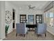 Bright office with hardwood floors, ship lap walls, and oversized windows at 2541 E Presidio St, Mesa, AZ 85213
