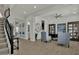 Spacious living room has tile floors, neutral paint and lots of natural light at 2541 E Presidio St, Mesa, AZ 85213