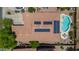 Aerial view of solar panels, backyard pool, patio, and desert landscaping at 271 W Key West W Dr, Casa Grande, AZ 85122