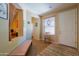 Charming entryway with tile floors, bench seating, and natural light from the front door at 271 W Key West W Dr, Casa Grande, AZ 85122
