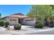 Charming single-story home with a well-manicured lawn, three-car garage, and inviting curb appeal at 271 W Key West W Dr, Casa Grande, AZ 85122