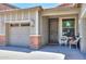 Welcoming covered entry featuring a security screen door and charming seating area at 271 W Key West W Dr, Casa Grande, AZ 85122