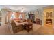 Spacious living room showcasing a comfortable sectional sofa, entertainment center, and natural light at 271 W Key West W Dr, Casa Grande, AZ 85122