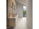 Stylish bathroom with double vanity, modern fixtures, and large window with greenery view at 3828 E Monterosa St, Phoenix, AZ 85018