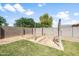 Backyard featuring lush lawn, a privacy fence and ready to be planted raised garden at 40020 N Cape Wrath Dr Dr, San Tan Valley, AZ 85140