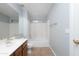 Well lit bathroom with updated sink and vanity and shower and tub combo at 40020 N Cape Wrath Dr Dr, San Tan Valley, AZ 85140