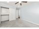 Bedroom featuring neutral walls, soft carpet, closet and entrance to another room at 40020 N Cape Wrath Dr Dr, San Tan Valley, AZ 85140