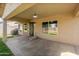 Inviting covered patio with ample space for entertaining, featuring direct access to the backyard at 40020 N Cape Wrath Dr Dr, San Tan Valley, AZ 85140
