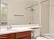Bathroom featuring vanity and mirror plus shower-bath combination and other bathroom fixtures at 4252 E Vest Ave, Gilbert, AZ 85295