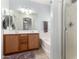 Bright bathroom featuring double vanity, tile flooring, soaking tub, and tiled shower at 4255 S Marisol Ln, Gilbert, AZ 85297