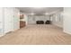 This large bonus room has carpeted floors, recessed lights, and many windows, ideal for entertaining at 4255 S Marisol Ln, Gilbert, AZ 85297