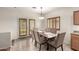 Bright dining area featuring direct access to a side yard through stylish French doors at 4255 S Marisol Ln, Gilbert, AZ 85297
