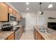 Well-equipped kitchen offering stainless steel appliances, ample cabinet space, and seamless flow to the living spaces at 4255 S Marisol Ln, Gilbert, AZ 85297