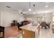 Open concept space, seamlessly integrating the kitchen, living area and dining area at 4255 S Marisol Ln, Gilbert, AZ 85297
