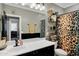 Charming bathroom featuring a well-lit vanity, decorative shower curtain, and neutral color palette at 4606 S Marron --, Mesa, AZ 85212