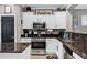 Bright kitchen showcases stainless steel appliances, granite counters and crisp white cabinetry at 4606 S Marron --, Mesa, AZ 85212