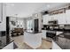 Modern kitchen with stainless steel appliances, granite counters, and a center island open to the dining area at 4606 S Marron --, Mesa, AZ 85212