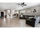 Bright living room boasts an open floor plan, tile flooring, recessed lighting, and comfortable seating at 4606 S Marron --, Mesa, AZ 85212
