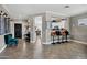 Bright living room featuring a wet bar with sleek countertops and stylish seating, perfect for entertaining at 4606 S Marron --, Mesa, AZ 85212