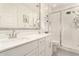 Beautiful bathroom featuring double sinks, quartz countertops, and a glass-enclosed shower at 4657 S Vapor --, Mesa, AZ 85212